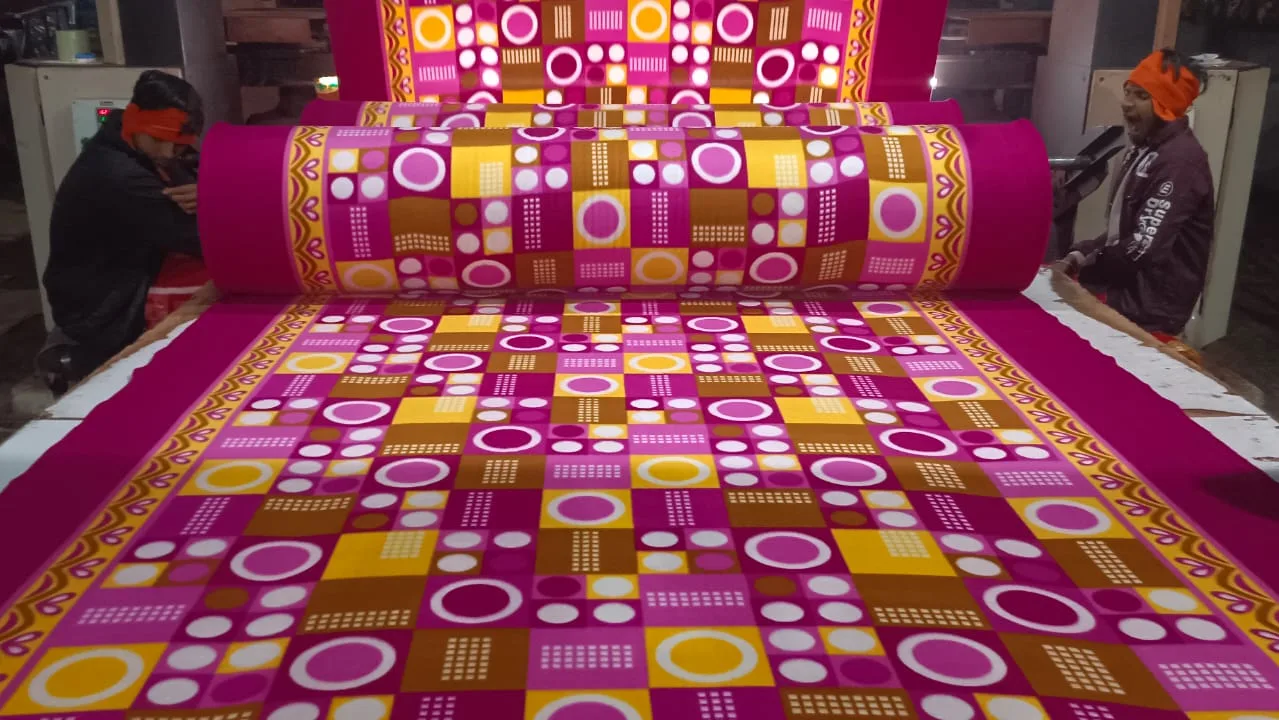 1000 GSM printed polar fleece blanket fabric in a magenta, yellow and brown circle print