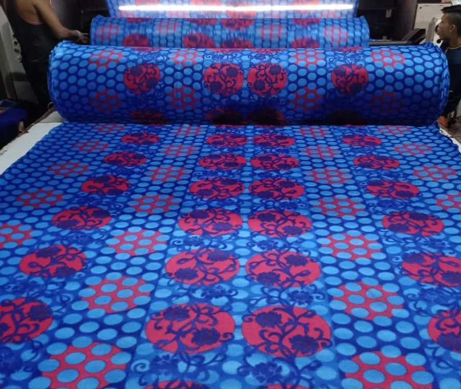 600 GSM printed polar fleece blanket fabric in a blue and red medallion print